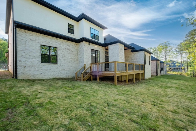221 Abington Cir, Little Rock, AR 72223 - rear view of house featuring a lawn, a deck, and brick siding