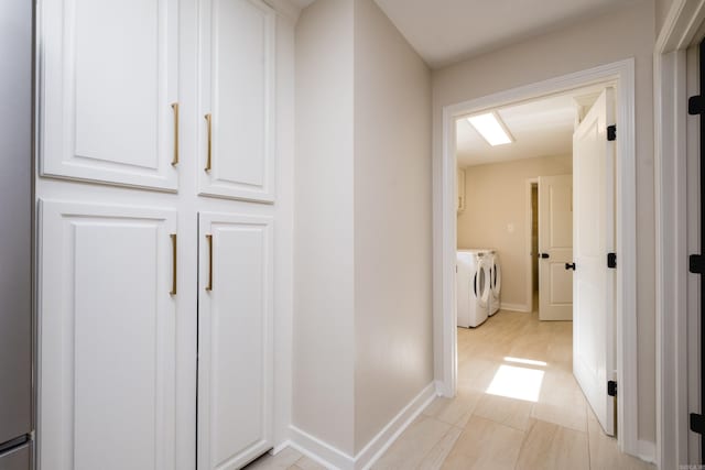 104 Dickson Dr, Little Rock, AR 72207 - corridor featuring baseboards and washer and clothes dryer