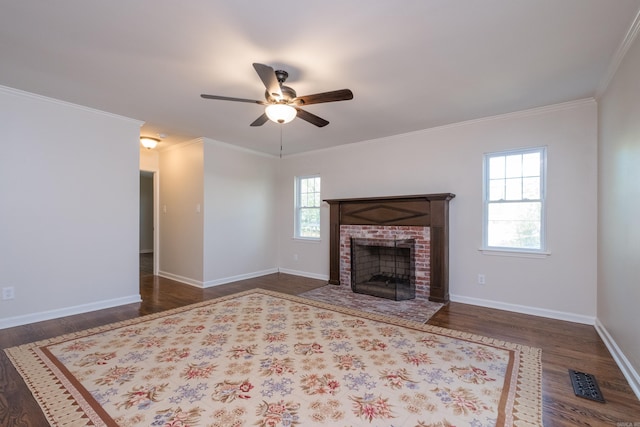 104 Dickson Dr, Little Rock, AR 72207 - unfurnished living room with visible vents, a wealth of natural light, a ceiling fan, and wood finished floors