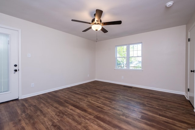 104 Dickson Dr, Little Rock, AR 72207 - empty room featuring dark wood-type flooring, visible vents, ceiling fan, and baseboards