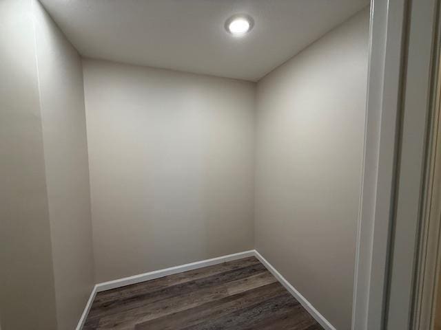 615 N Pruett, Paragould, AR 72450 - unfurnished room featuring baseboards, recessed lighting, and dark wood-type flooring