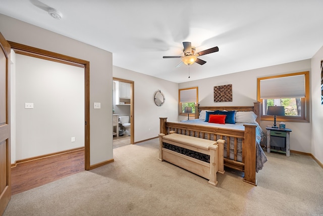 166 Heatherwood, Hot Springs, AR 71913 - bedroom with light carpet, multiple windows, baseboards, and a ceiling fan