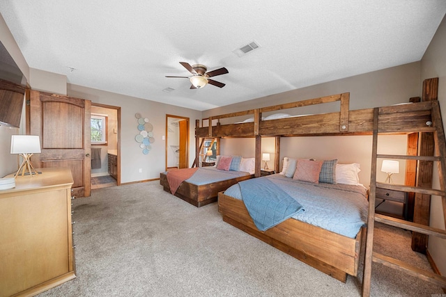 166 Heatherwood, Hot Springs, AR 71913 - bedroom featuring baseboards, light carpet, a textured ceiling, connected bathroom, and visible vents