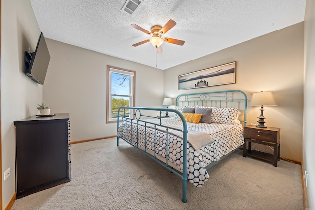 166 Heatherwood, Hot Springs, AR 71913 - carpeted bedroom featuring visible vents, baseboards, a ceiling fan, and a textured ceiling