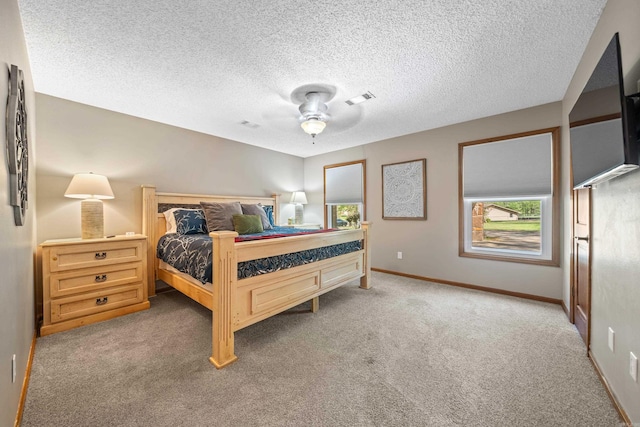 166 Heatherwood, Hot Springs, AR 71913 - bedroom with ceiling fan, a textured ceiling, visible vents, light carpet, and baseboards