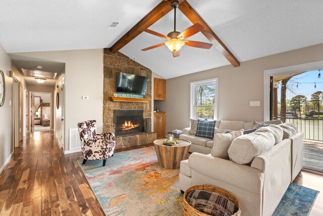 166 Heatherwood, Hot Springs, AR 71913 - living area featuring visible vents, ceiling fan, wood-type flooring, and a fireplace