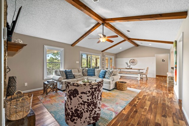 166 Heatherwood, Hot Springs, AR 71913 - living room featuring lofted ceiling with beams, a ceiling fan, hardwood / wood-style flooring, and a textured ceiling