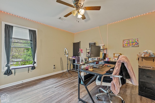 1104 Cartwright, Jonesboro, AR 72401 - office featuring wood finished floors, ceiling fan, baseboards, and visible vents