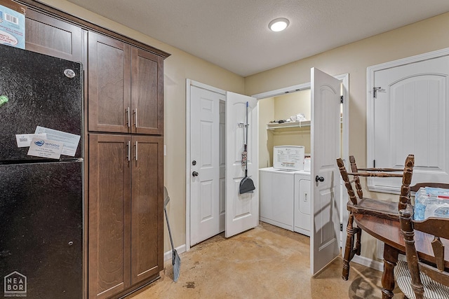 1104 Cartwright, Jonesboro, AR 72401 - washroom featuring baseboards, washer and dryer, and laundry area