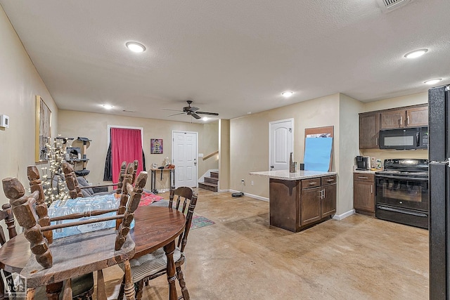 1104 Cartwright, Jonesboro, AR 72401 - dining space with concrete flooring, recessed lighting, a ceiling fan, and stairs