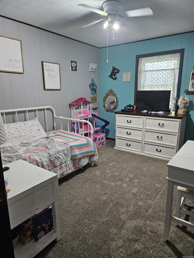 1139 Crescent Dr, Mena, AR 71953 - bedroom with ceiling fan, carpet, and a textured ceiling