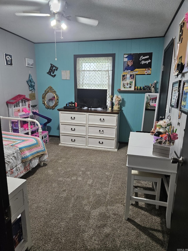 1139 Crescent Dr, Mena, AR 71953 - bedroom with a textured ceiling, ceiling fan, and carpet floors