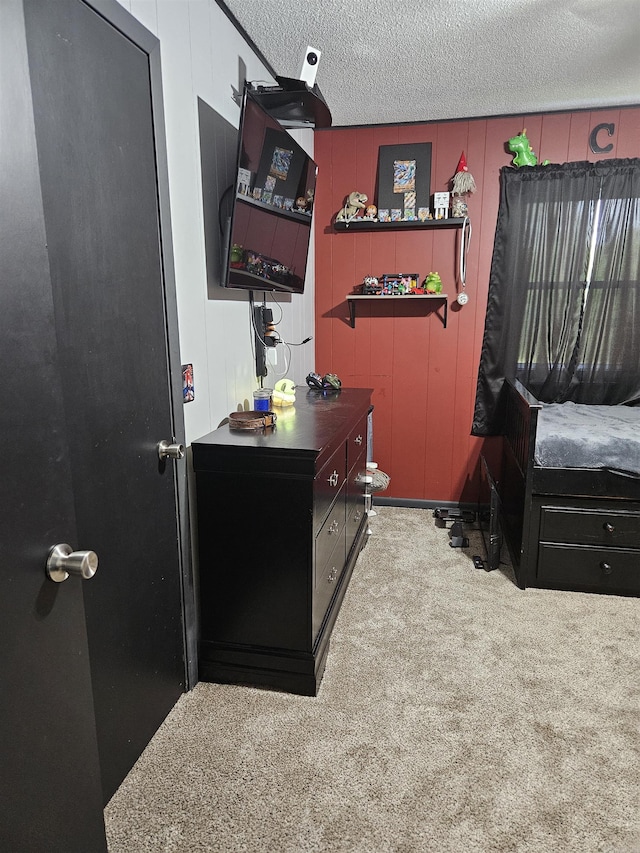1139 Crescent Dr, Mena, AR 71953 - carpeted bedroom with a textured ceiling