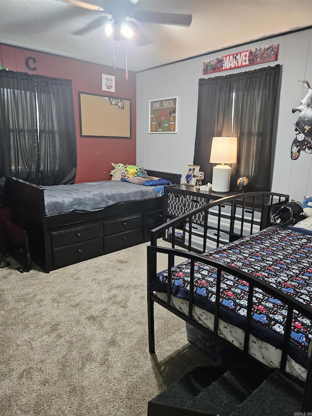 1139 Crescent Dr, Mena, AR 71953 - bedroom featuring ceiling fan and carpet flooring