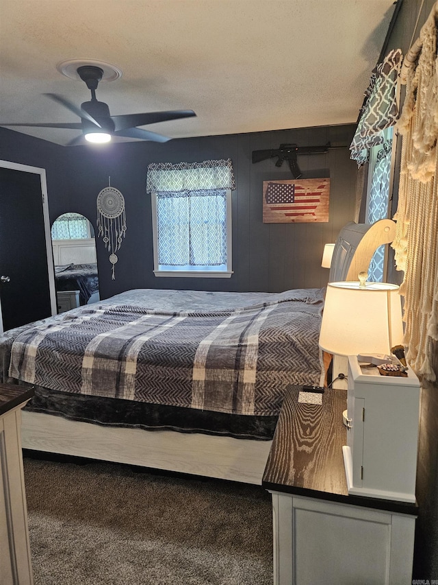 1139 Crescent Dr, Mena, AR 71953 - carpeted bedroom featuring ceiling fan