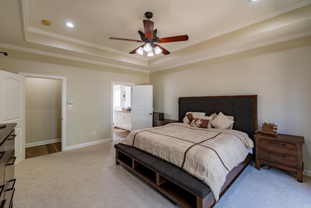 bedroom featuring baseboards, ornamental molding, recessed lighting, carpet flooring, and a tray ceiling