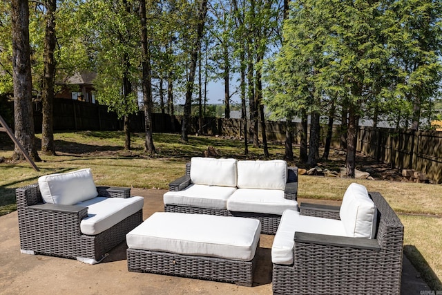 view of patio with a fenced backyard and outdoor lounge area