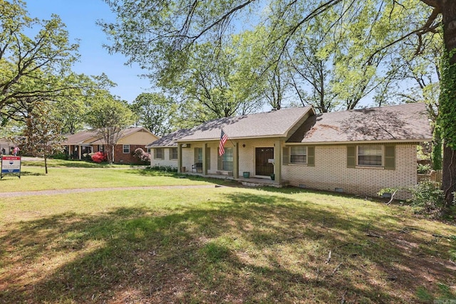 ranch-style house featuring crawl space, a front lawn, and brick siding