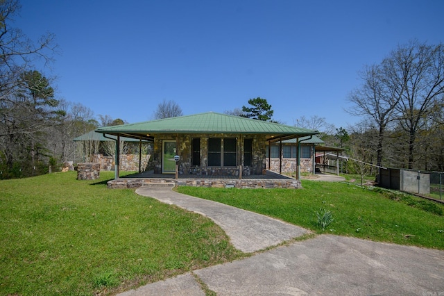 1295 Polk Road 47, Mena, AR 71953 - view of front of home with stone siding, a front yard, metal roof, fence, and covered porch