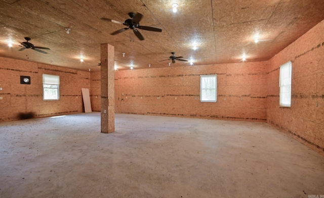 1295 Polk Road 47, Mena, AR 71953 - basement with a healthy amount of sunlight and ceiling fan