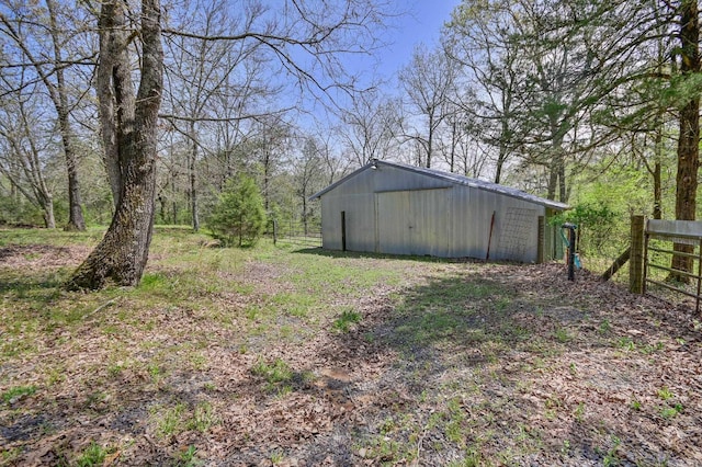 1295 Polk Road 47, Mena, AR 71953 - view of yard with an outbuilding, fence, and a pole building