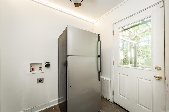 laundry area featuring laundry area, hookup for an electric dryer, and washer hookup