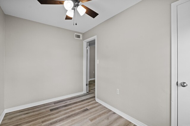 1216 Wade Ave, Judsonia, AR 72081 - spare room with visible vents, light wood-style flooring, ceiling fan, and baseboards
