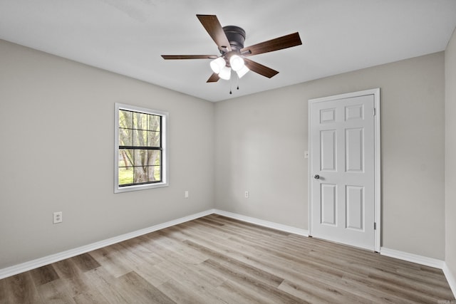 1216 Wade Ave, Judsonia, AR 72081 - spare room featuring light wood-style flooring, baseboards, and a ceiling fan