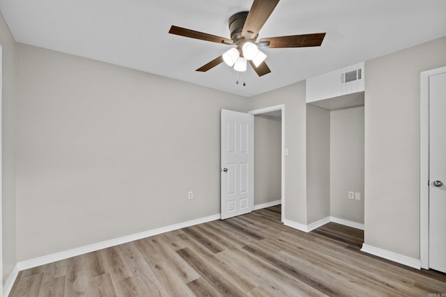 1216 Wade Ave, Judsonia, AR 72081 - unfurnished bedroom with light wood-style floors, visible vents, baseboards, and a ceiling fan