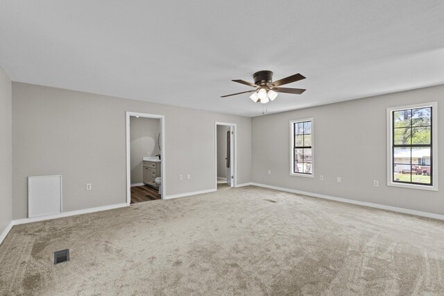 1216 Wade Ave, Judsonia, AR 72081 - unfurnished room featuring visible vents, baseboards, a ceiling fan, and carpet