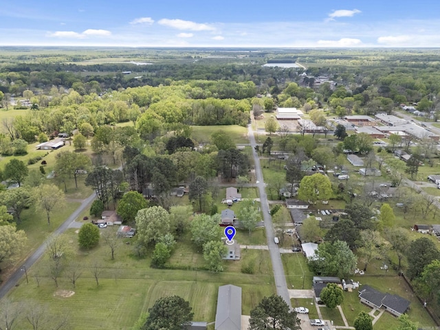 1216 Wade Ave, Judsonia, AR 72081 - birds eye view of property featuring a wooded view