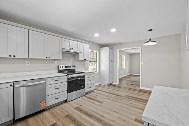 1216 Wade Ave, Judsonia, AR 72081 - kitchen featuring baseboards, appliances with stainless steel finishes, under cabinet range hood, light wood finished floors, and recessed lighting
