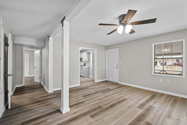 1216 Wade Ave, Judsonia, AR 72081 - interior space with wood finished floors, baseboards, and a ceiling fan
