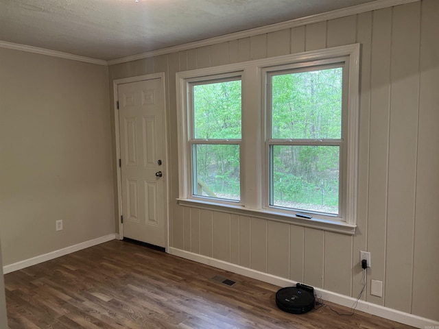 5301 Owensville Cutoff, Lonsdale, AR 72087 - unfurnished room with a healthy amount of sunlight, baseboards, ornamental molding, and visible vents