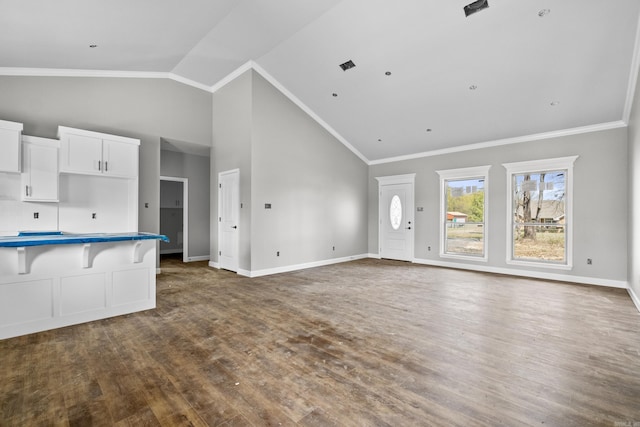 unfurnished living room featuring high vaulted ceiling, baseboards, dark wood-style floors, and visible vents