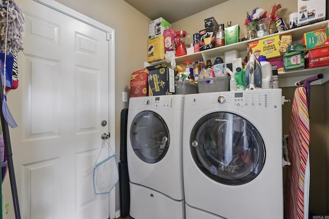clothes washing area with laundry area and independent washer and dryer