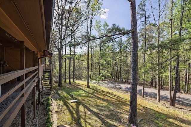 view of yard with a wooded view