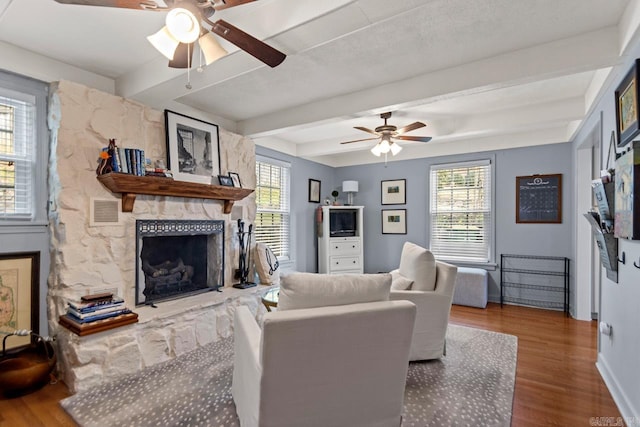 5400 Southwood Rd, Little Rock, AR 72205 - living area featuring wood finished floors, ceiling fan, visible vents, and plenty of natural light