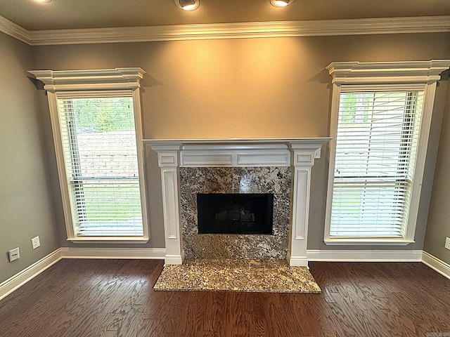 1844 White Oak Cir, Benton, AR 72019 - unfurnished living room with baseboards, ornamental molding, plenty of natural light, dark wood-type flooring, and a premium fireplace