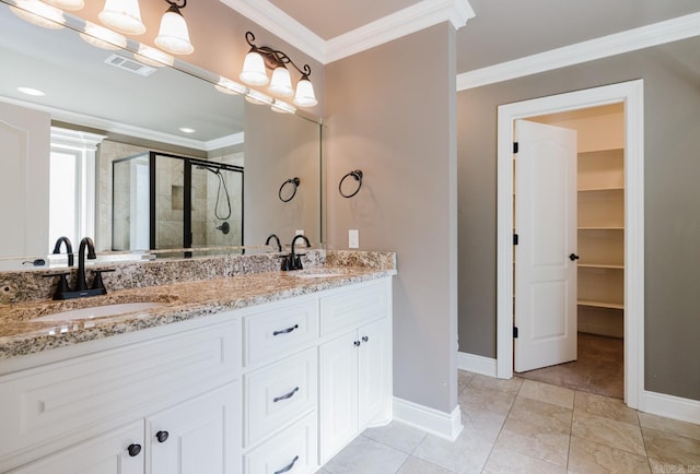 1844 White Oak Cir, Benton, AR 72019 - bathroom featuring baseboards, a stall shower, a sink, and visible vents