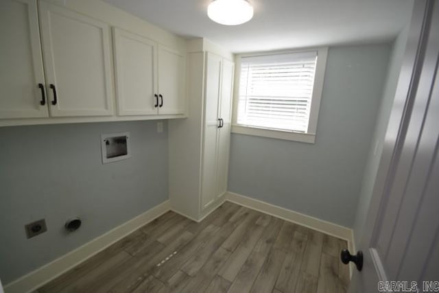 12904 Southridge Dr, Little Rock, AR 72212 - laundry room with electric dryer hookup, dark wood finished floors, cabinet space, baseboards, and hookup for a washing machine