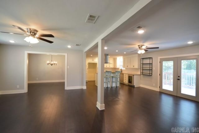 12904 Southridge Dr, Little Rock, AR 72212 - unfurnished living room with a ceiling fan, baseboards, dark wood finished floors, french doors, and recessed lighting