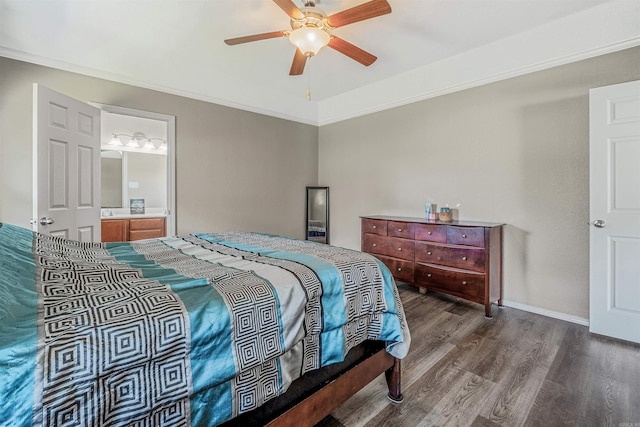 bedroom with a ceiling fan, connected bathroom, and wood finished floors