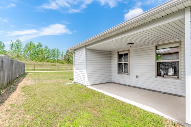 view of yard with a patio area and fence
