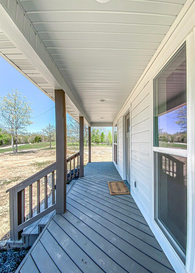 wooden deck featuring a porch