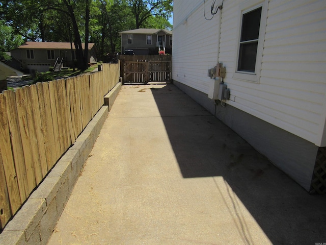 view of home's exterior featuring fence