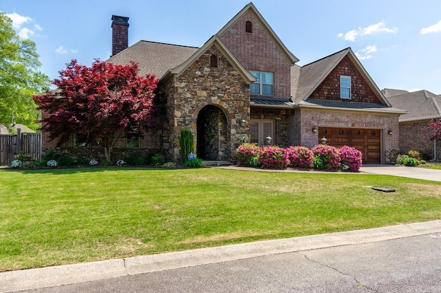 1130 Applewood Dr, Conway, AR 72034 - view of front of property featuring concrete driveway, a chimney, a front yard, a garage, and fence