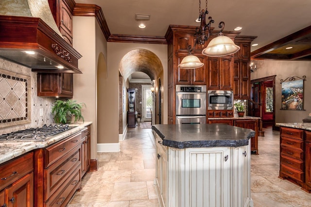 1130 Applewood Dr, Conway, AR 72034 - kitchen featuring arched walkways, crown molding, stainless steel appliances, custom range hood, and decorative backsplash
