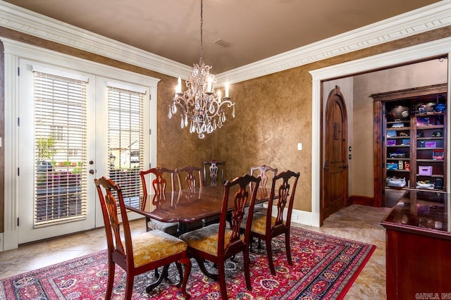1130 Applewood Dr, Conway, AR 72034 - dining room with baseboards, a notable chandelier, visible vents, and ornamental molding