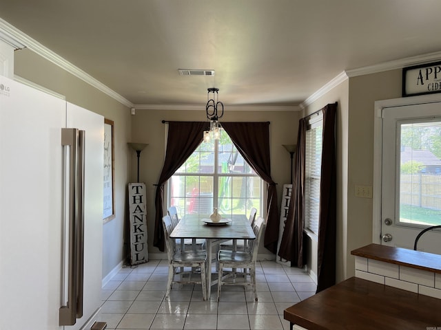 200 Blue Bird Cv, White Hall, AR 71602 - dining area featuring visible vents, baseboards, light tile patterned flooring, and a wealth of natural light